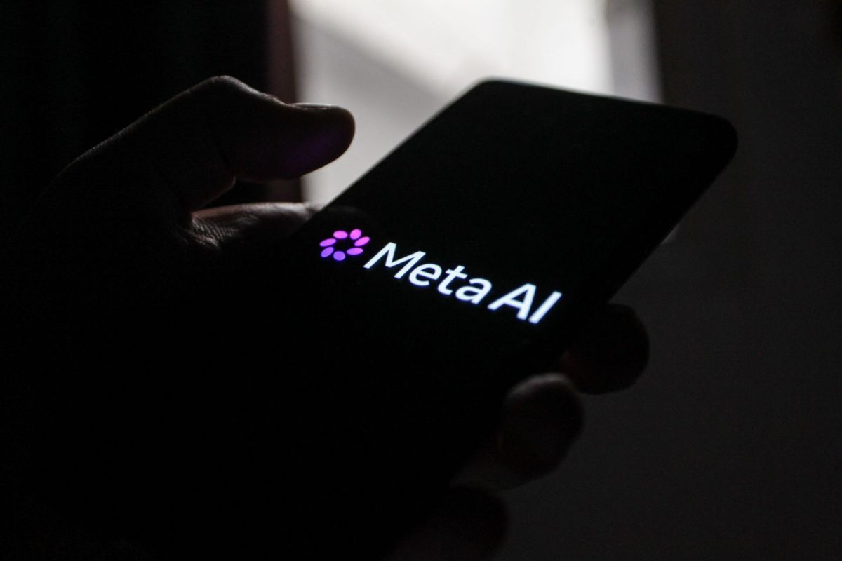 A Meta AI logo on a smartphone.