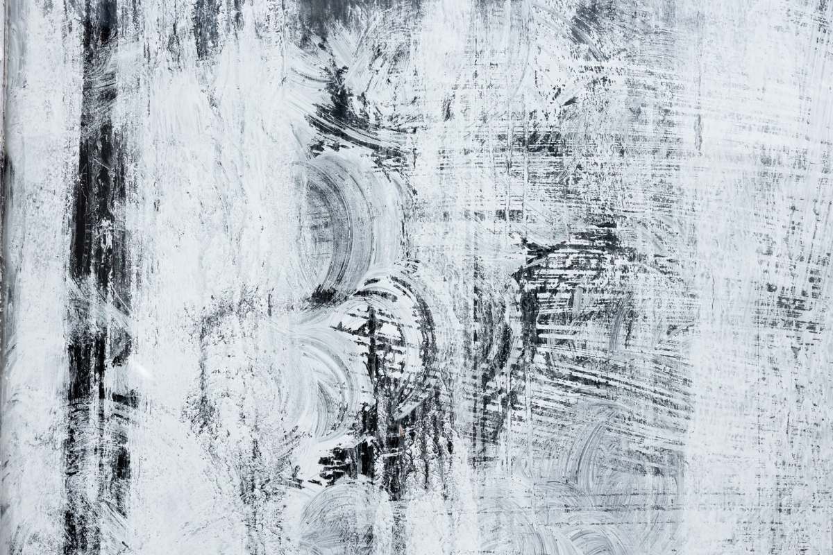 Chalk powder covering a black surface.