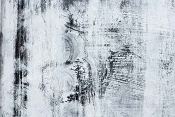 Chalk powder covering a black surface.