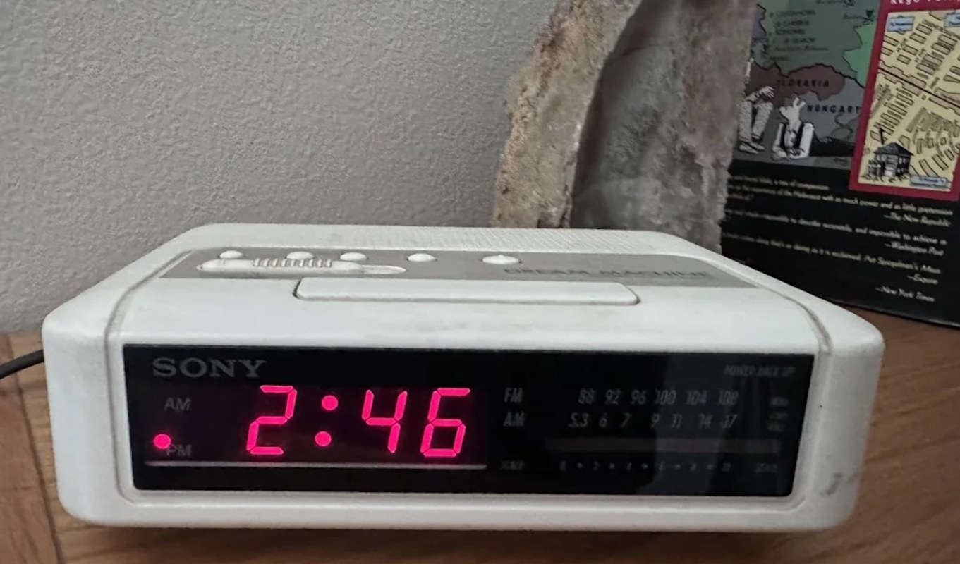 A digital alarm clock.
