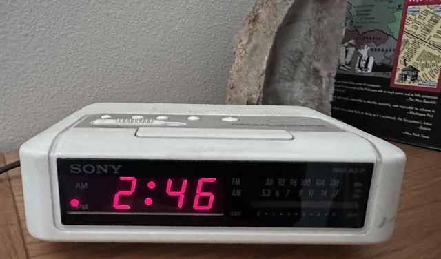 A digital alarm clock.