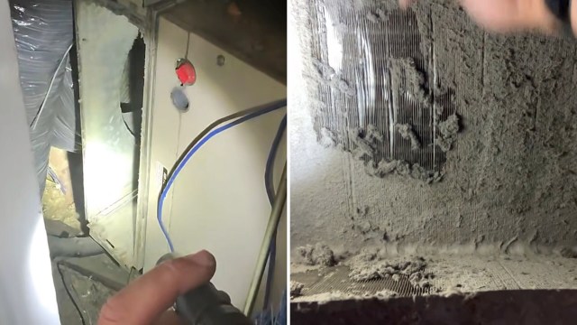 A close-up view of an HVAC system showing dust buildup and electrical components inside an access panel.