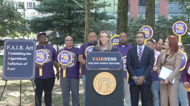New Jersey Gov. Mikie Sherrill signing the FAIR act.