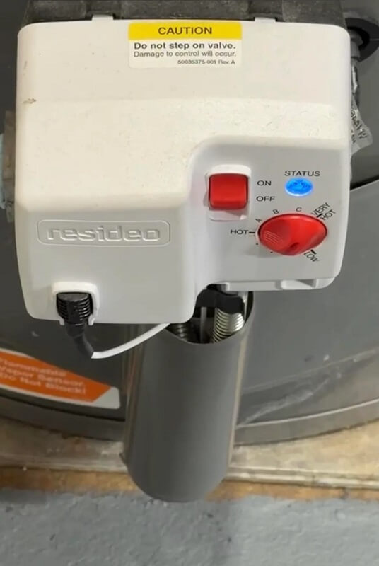 The settings panel on a water tank.