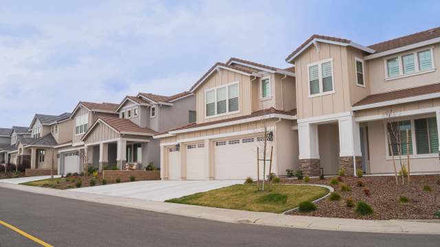 A row of houses in a suburban neighborhood.