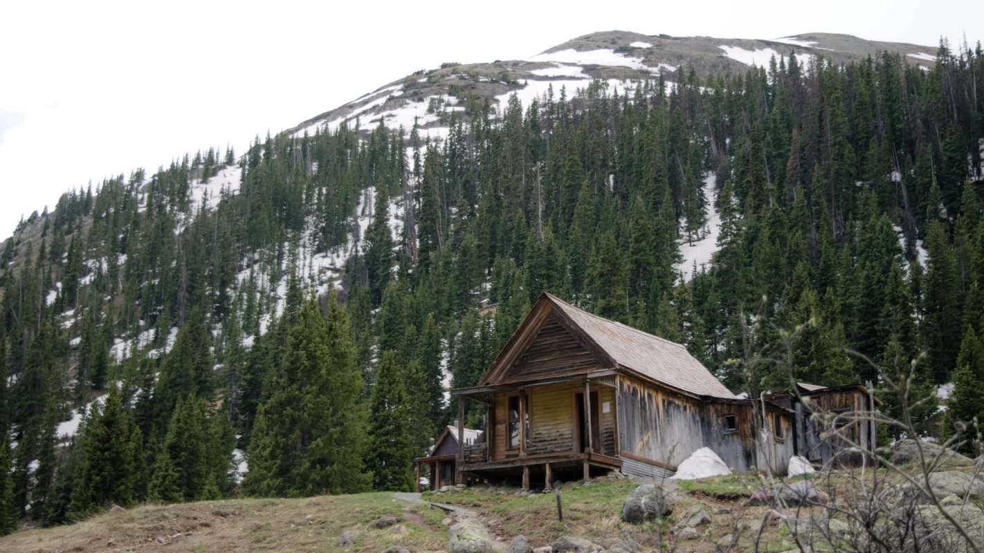 A wood cabin in the mountains.