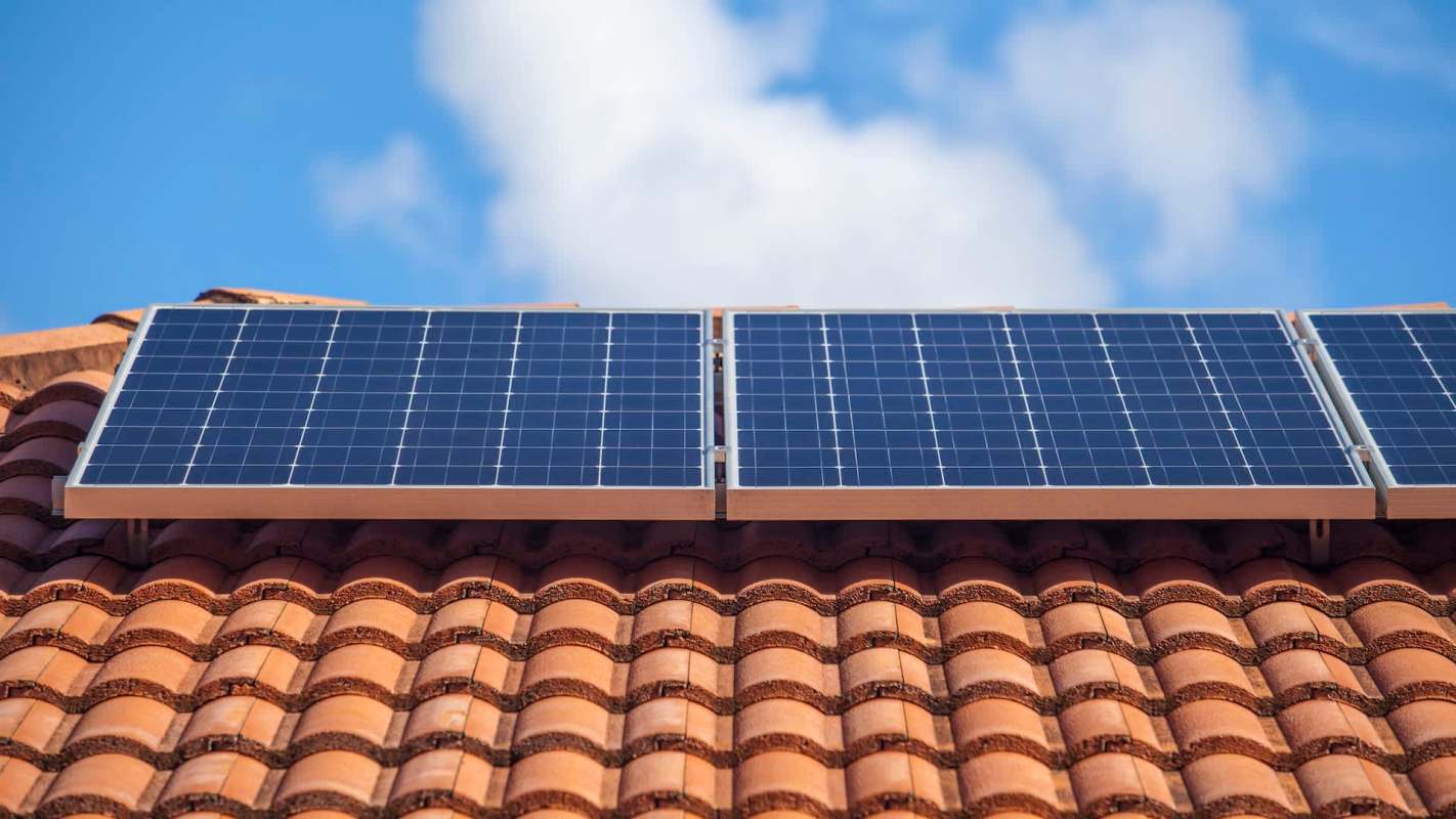 Solar panels on a tiled roof.