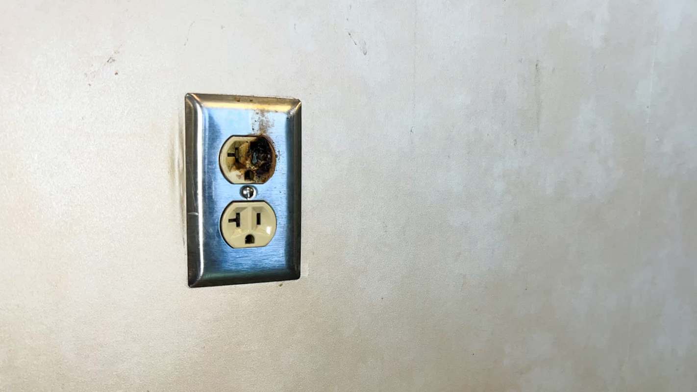 A burnt electrical outlet.