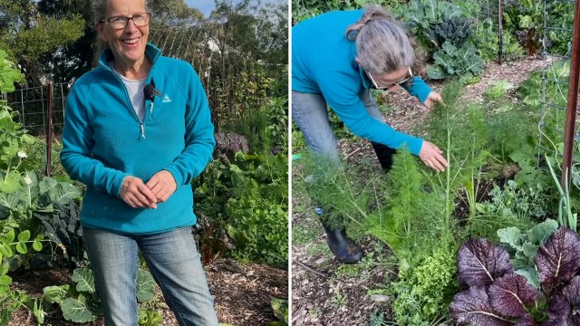 A woman showcasing her vegetable garden.