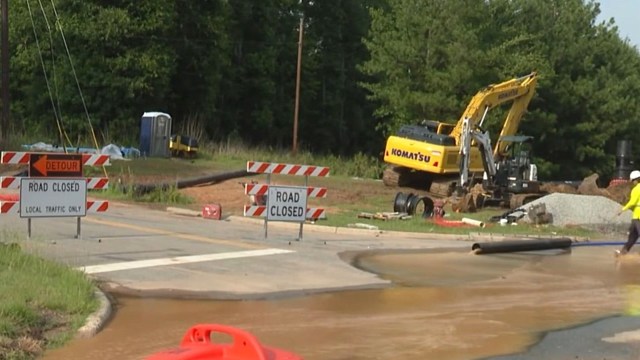 A road closed due to a water main break.