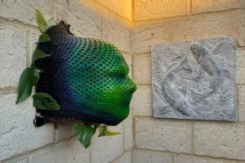 A radiation mask turned into a garden planter.