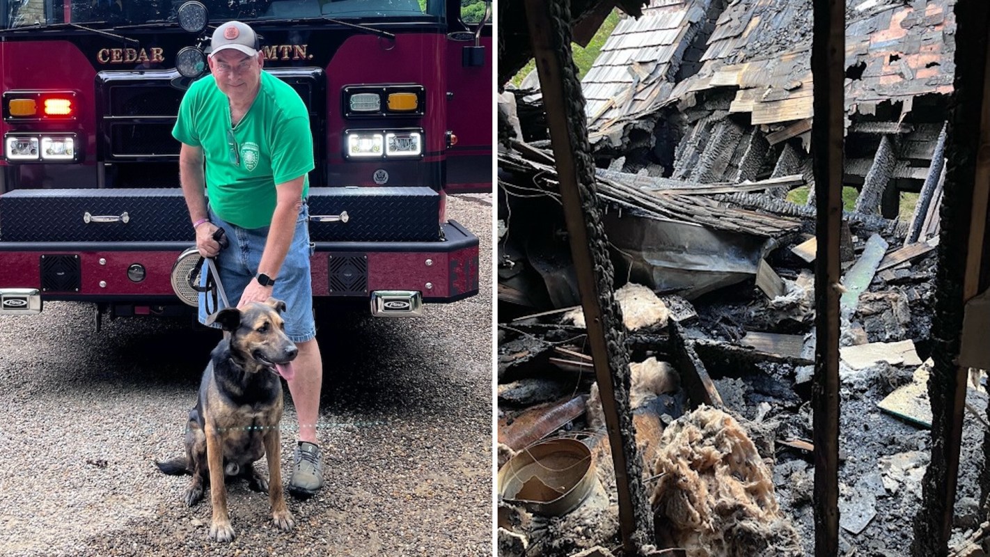 A man with rescue dog Bing Crosby in front of a fire truck and a fire-damaged house.