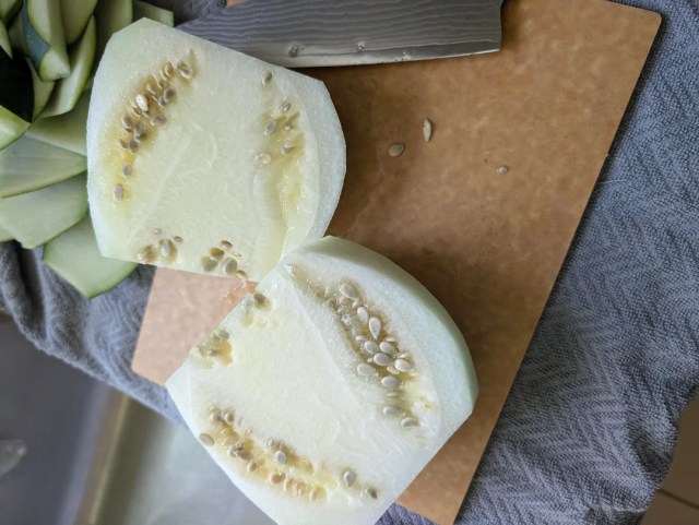 Two slices of a Sugar Baby watermelon.