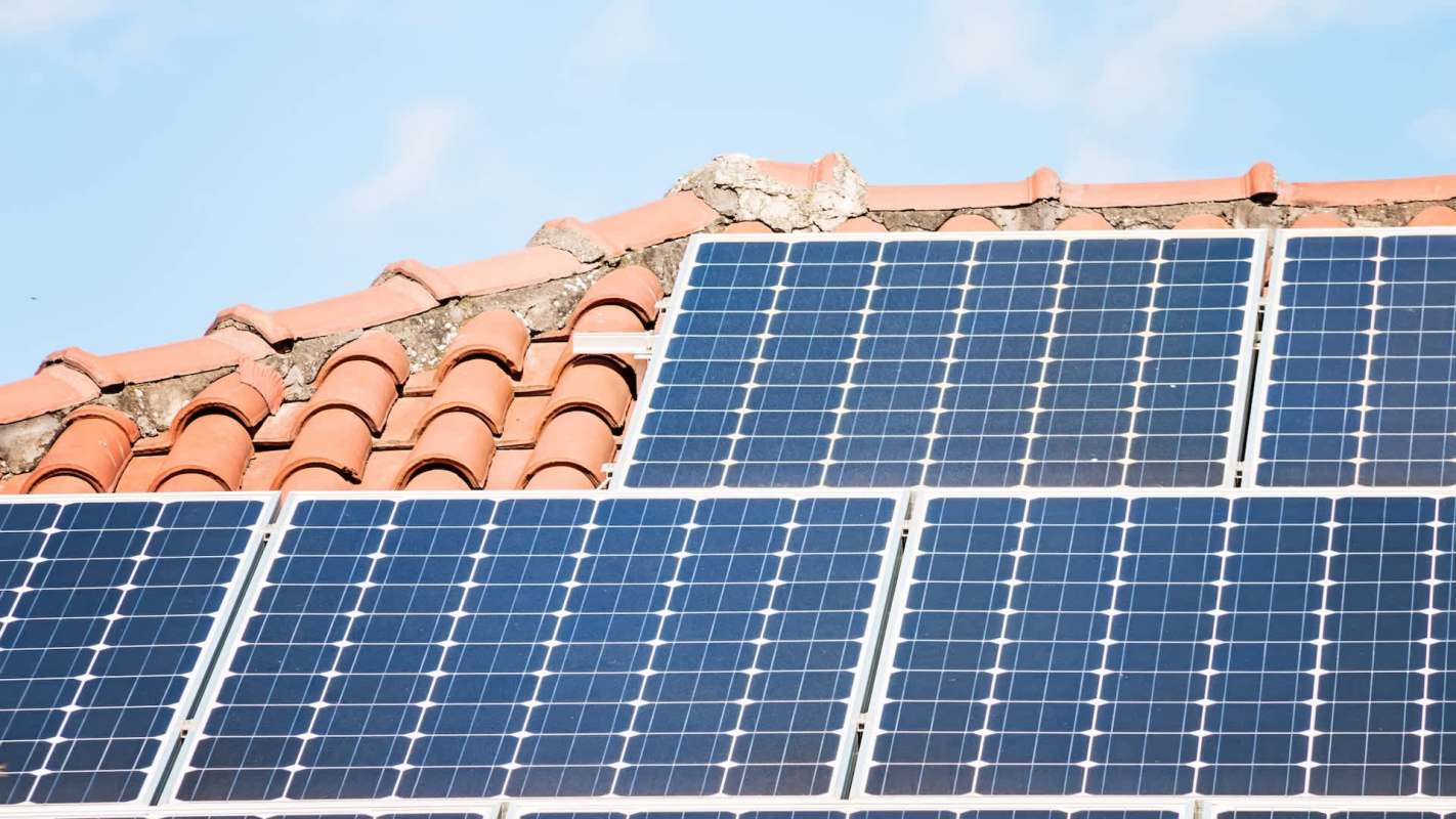 Solar panels on a tile roof.