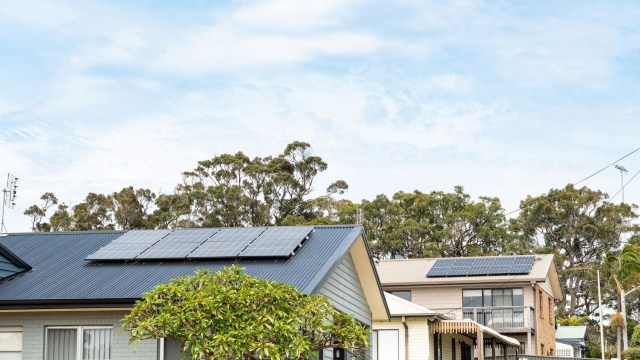 Homes with rooftop solar panels.