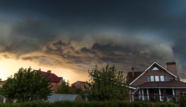 A stormy sky over a suburban neighborhood.