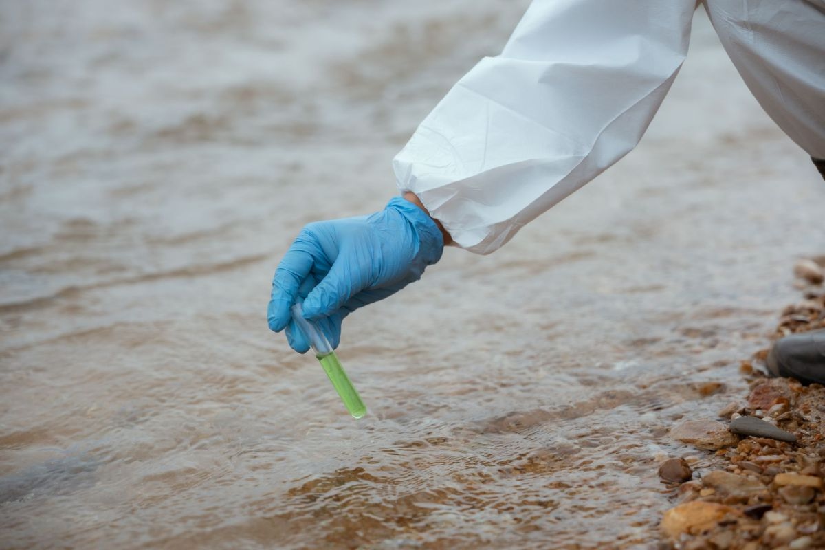 Taking a water sample.