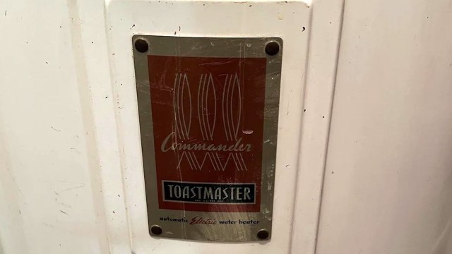 A vintage Toastmaster "Commander" electric water heater.