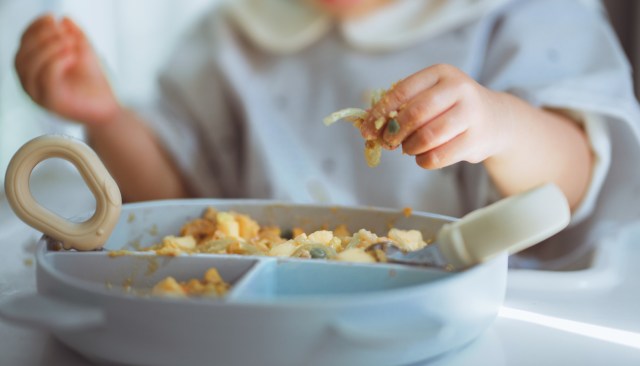 A baby eating.