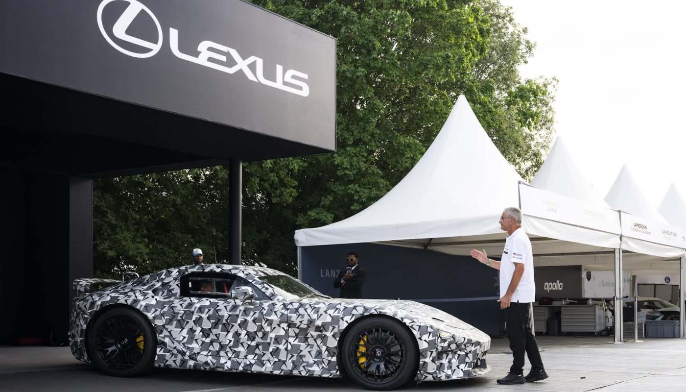 An electric LFA hypercar under a Lexus sign.