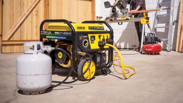 A generator hooked up to a propane tank.