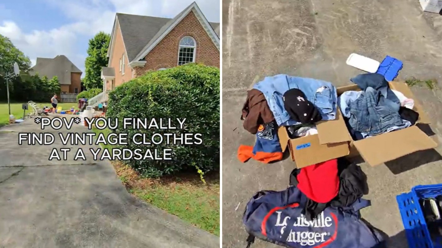 A yard sale scene featuring vintage clothing displayed on a driveway.