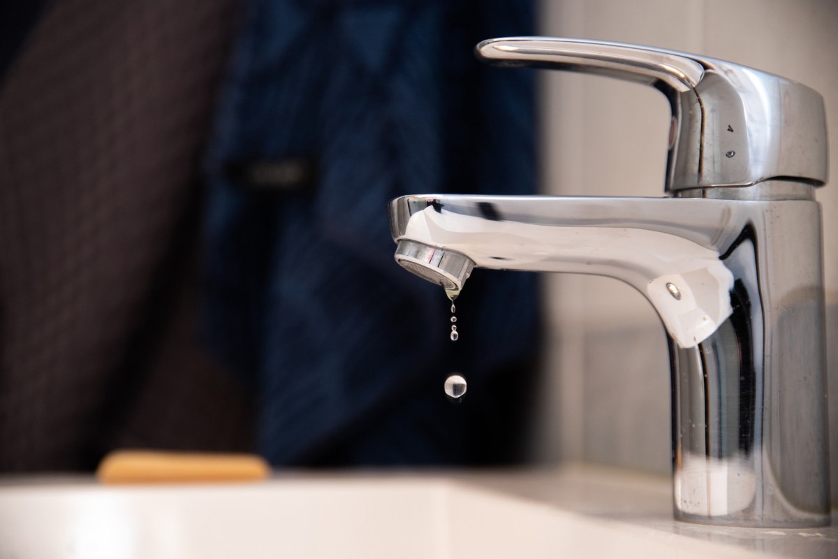 A faucet dripping water.