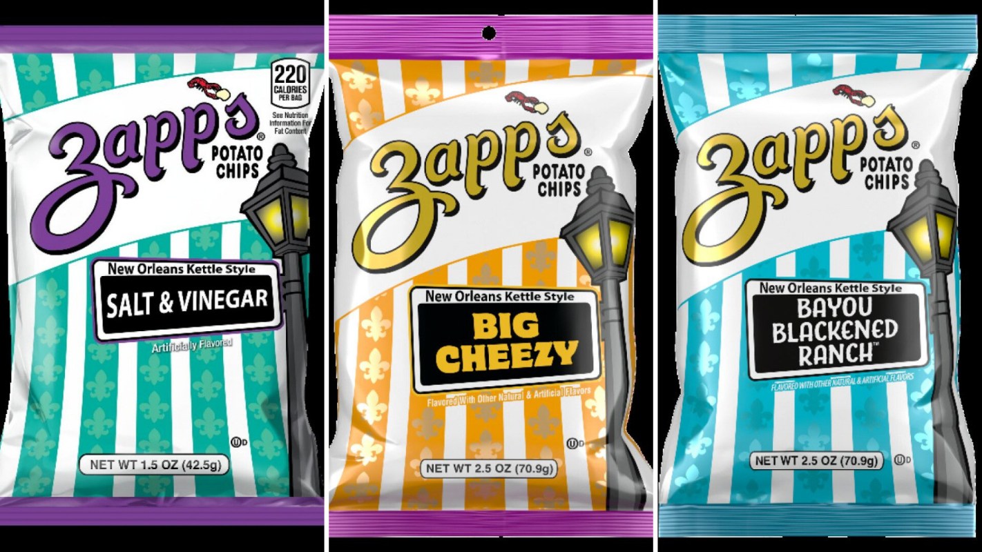 Three bags of Zapp's potato chips featuring Salt & Vinegar, Big Cheezy, and Bayou Blackened Ranch flavors.