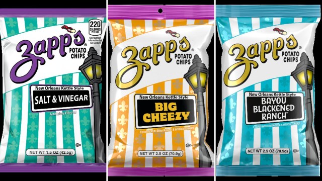 Three bags of Zapp's potato chips featuring Salt & Vinegar, Big Cheezy, and Bayou Blackened Ranch flavors.