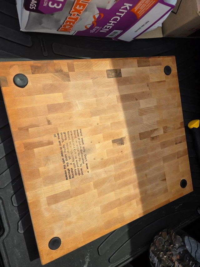 Cleaning instructions written on the chopping board.