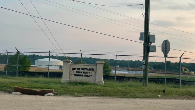 Sign for the City of Southaven Public Safety Training Facility with a fenced area and construction equipment in the background.
