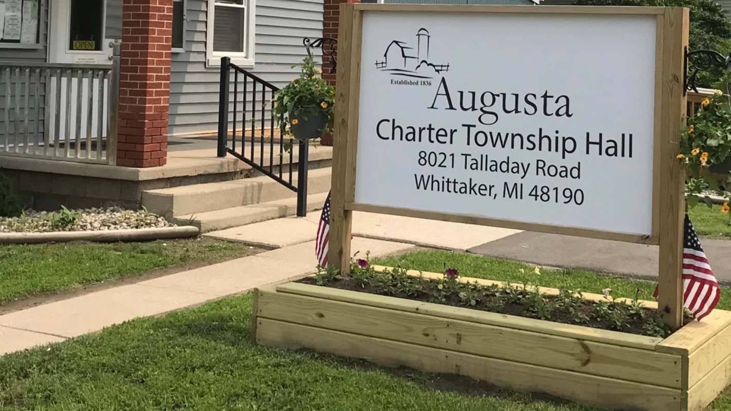 A sign for Augusta Charter Township Hall.