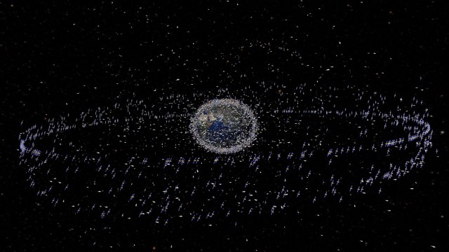 Earth surrounded by satellites and space debris.
