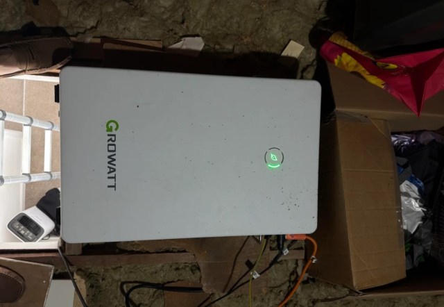 A Growatt battery in a loft.