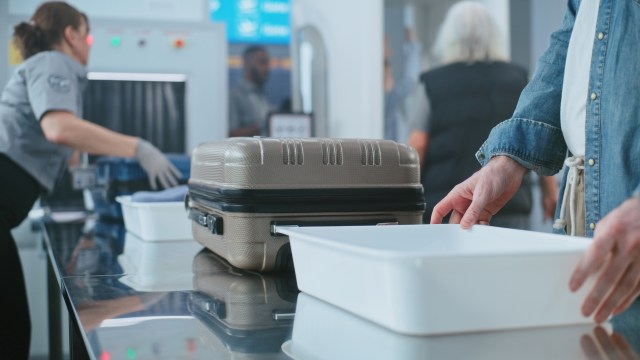 An airport traveler at a security checkpoint.