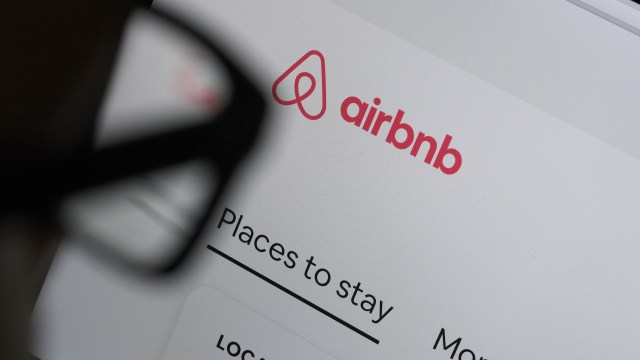 The Airbnb website displaying the logo and options for accommodation.