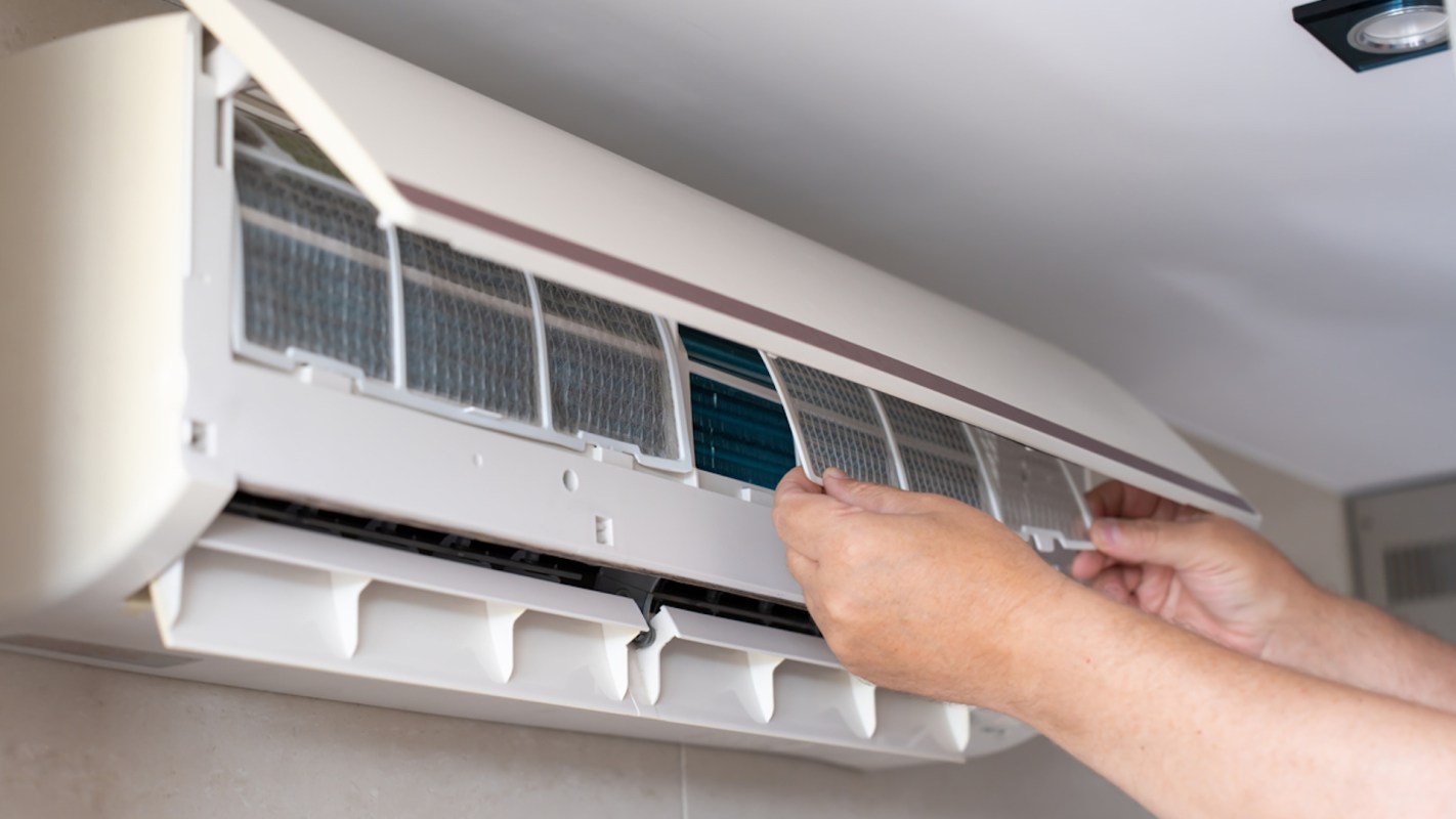 Indoor Air Conditioning Unit Under Filter Maintenance.