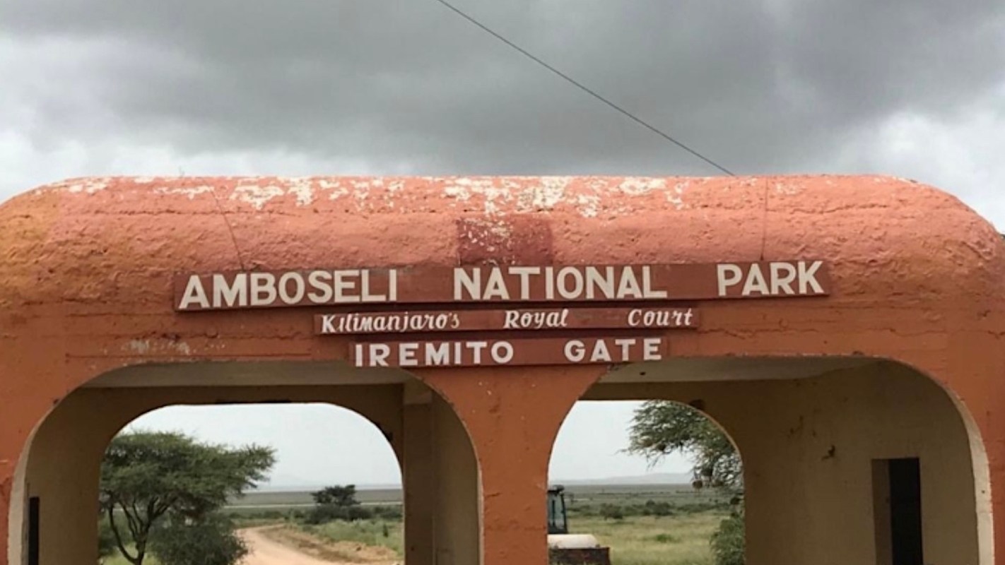An entrance sign for Amboseli National Park, labeled "Iremito Gate."