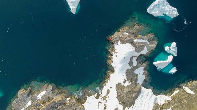 A rocky and icy coastline.