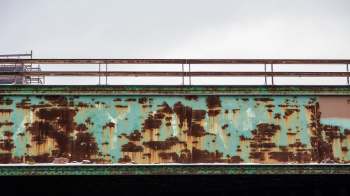 Rust and corrosion on train tracks.