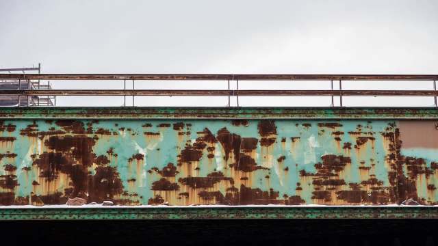 Rust and corrosion on train tracks.