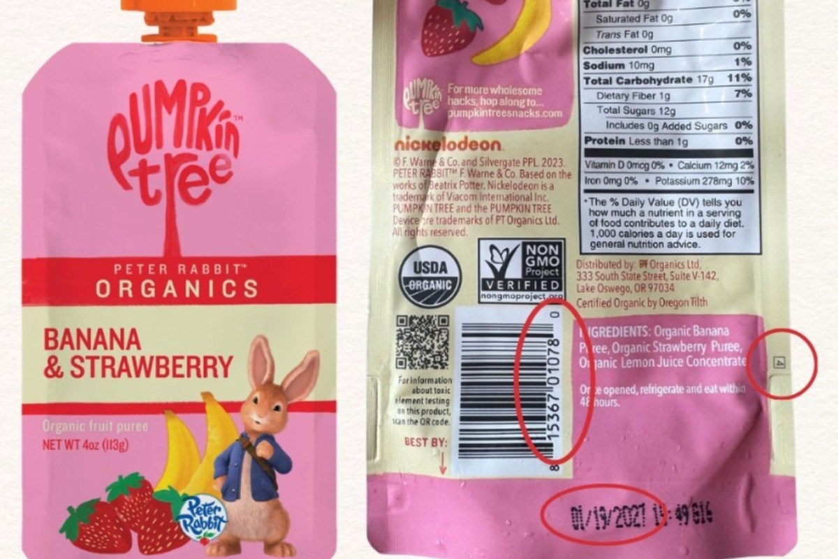 An organic fruit puree pouch featuring banana and strawberry flavors with Peter Rabbit branding.