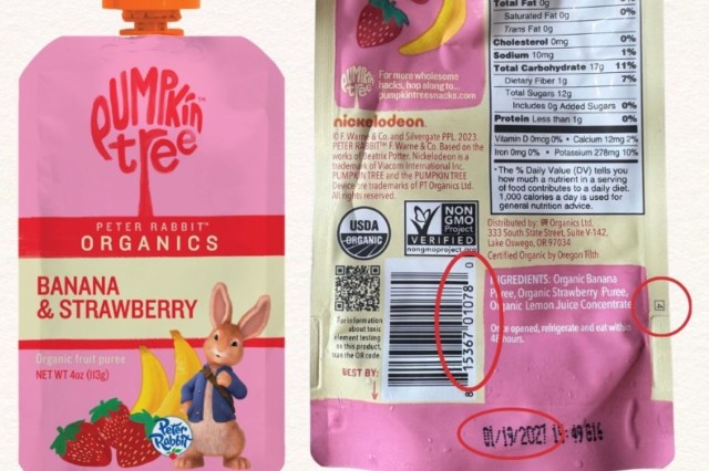 An organic fruit puree pouch featuring banana and strawberry flavors with Peter Rabbit branding.