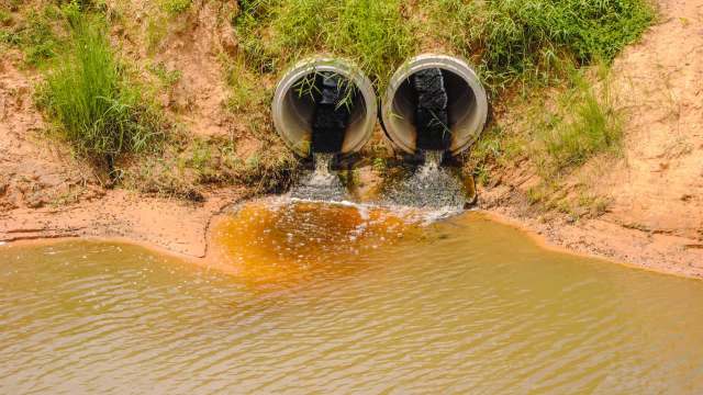 Two drainage pipes discharging wastewater.