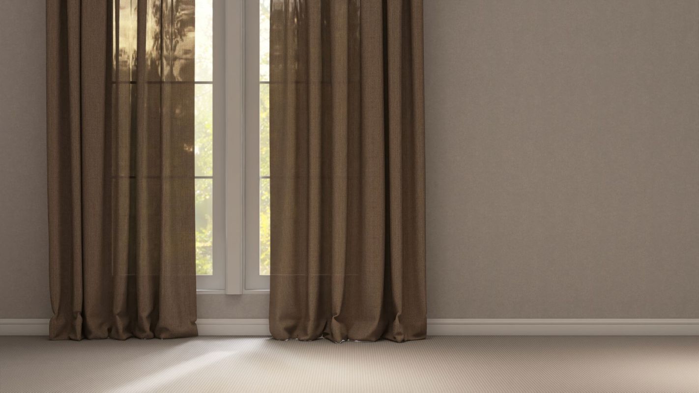 Blackout curtains covering windows.