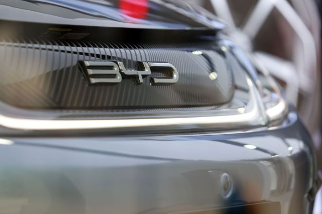 A BYD logo on the front of a car.