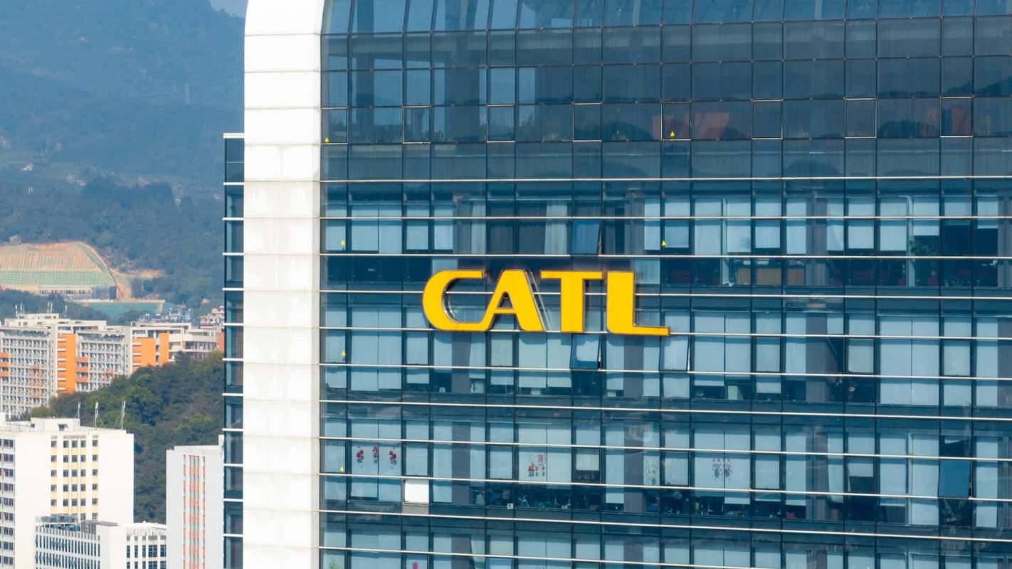 A building with the yellow logo "CATL" prominently displayed on its glass facade.