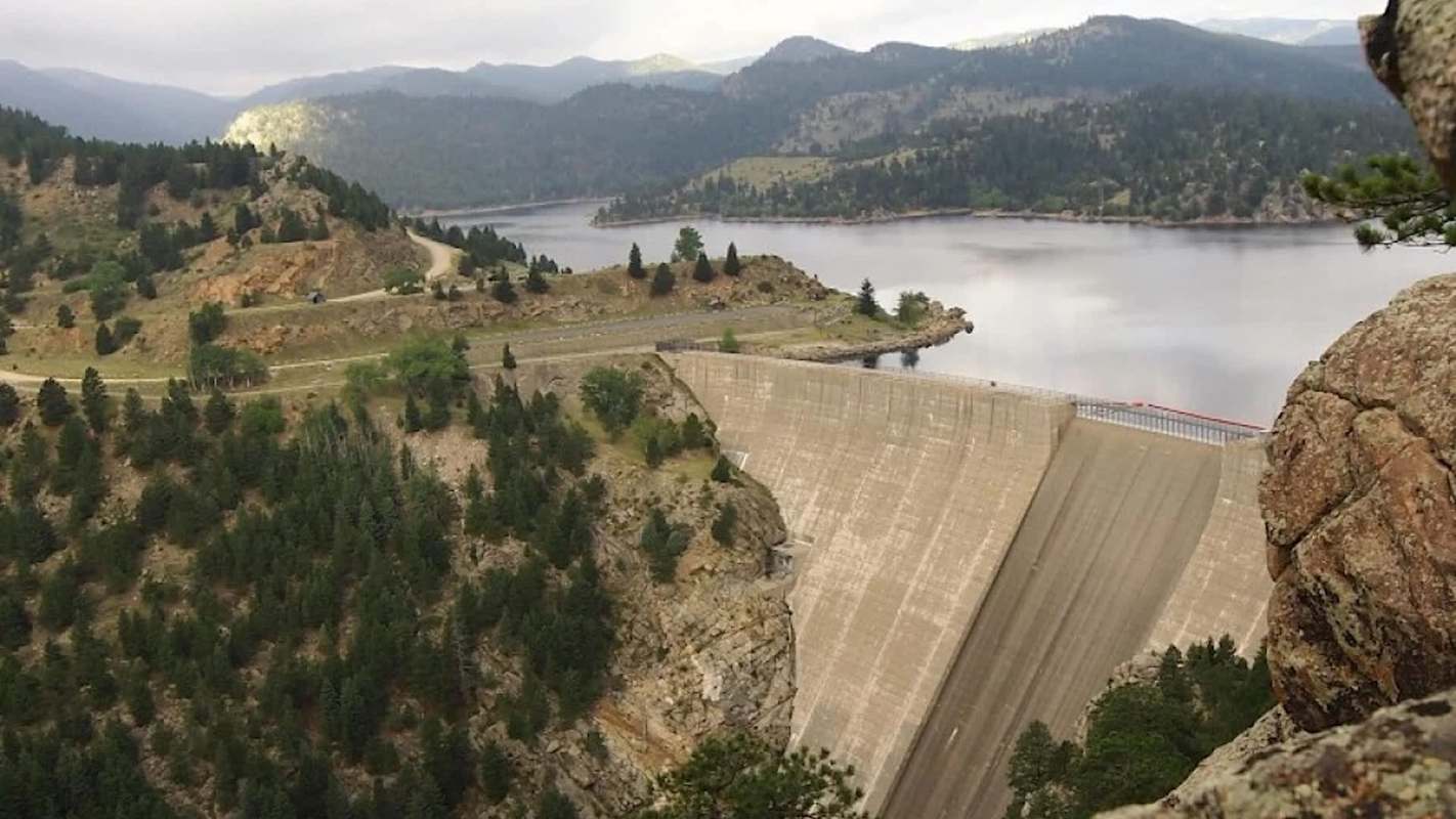 A dam next to a lake.
