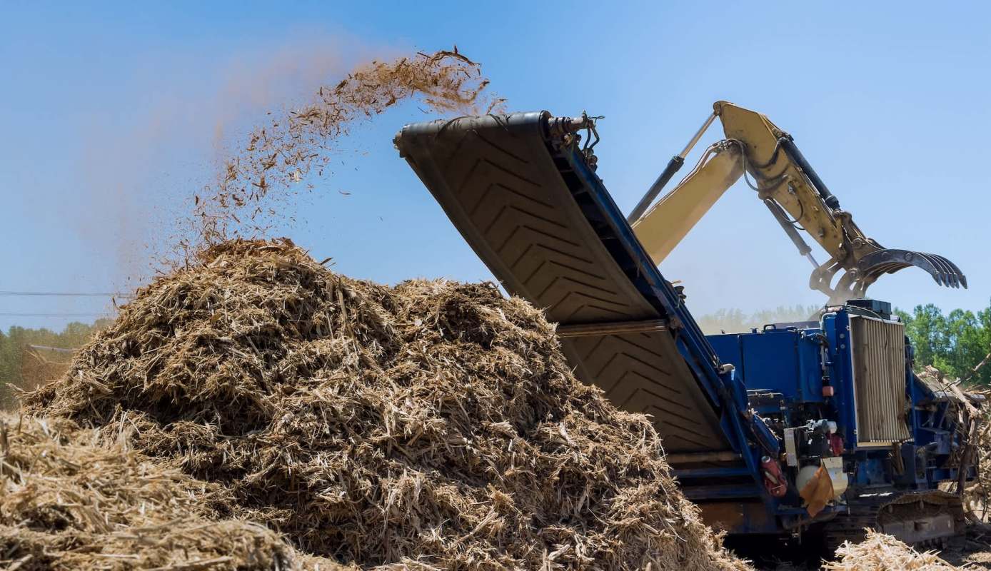 A machine processing wood chips.