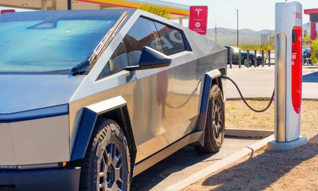 A Tesla Cybertruck at a Supercharger station.